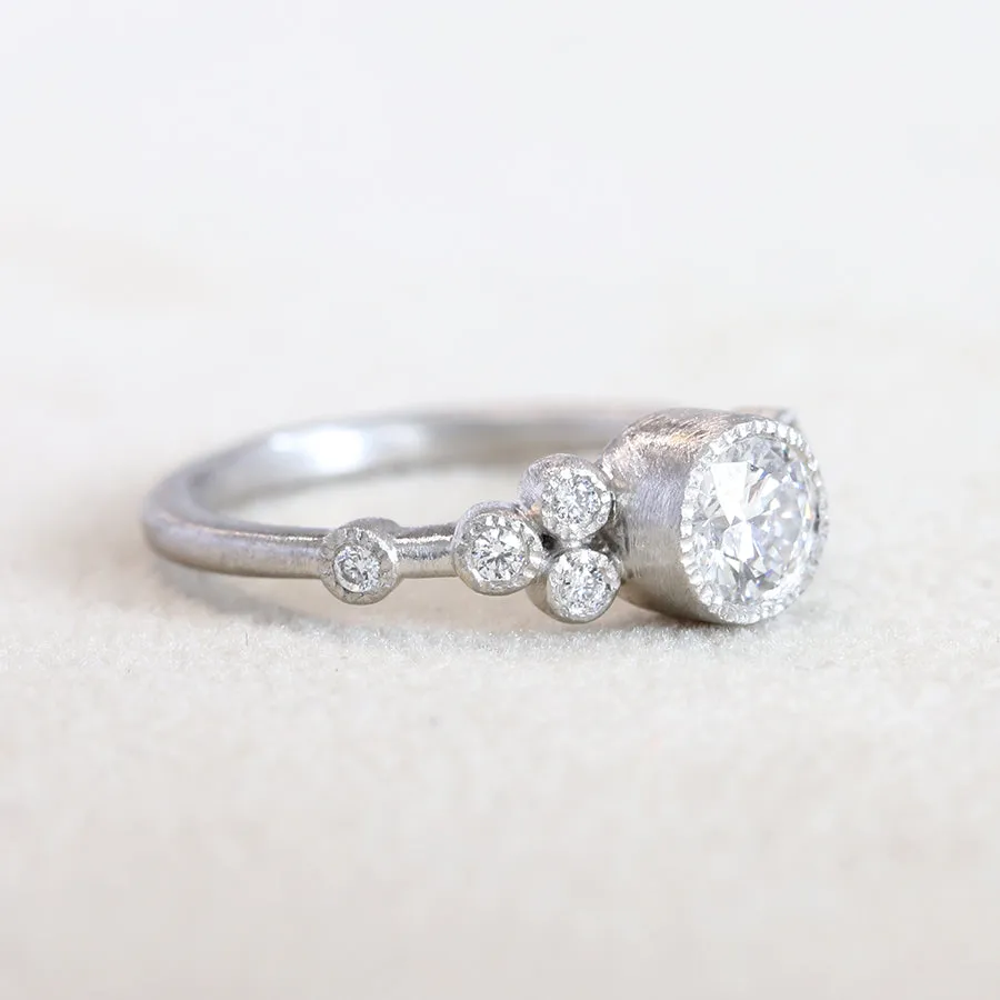 9 bezel diamond ring
