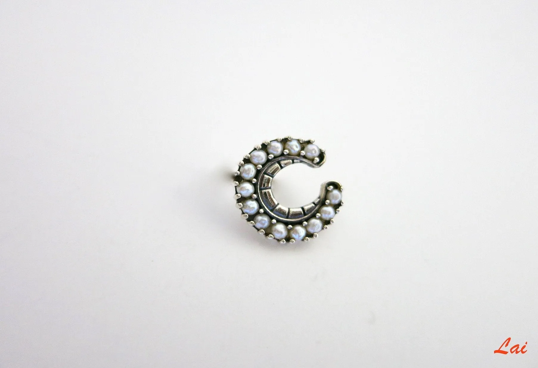Exquisite, crescent shape, pearls encrusted nose pin