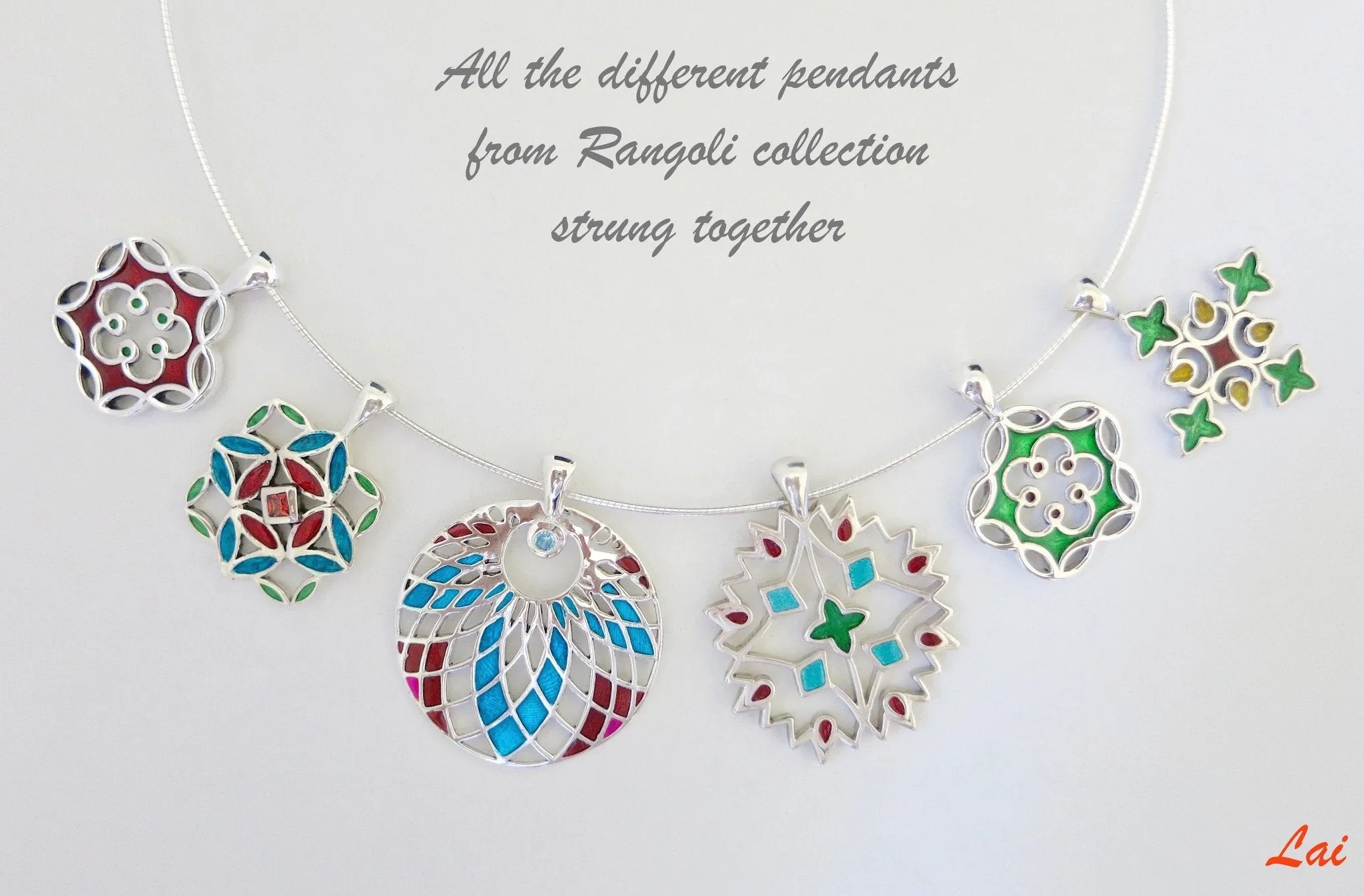 Exquisite, jali cut-out pattern round enamel pendant