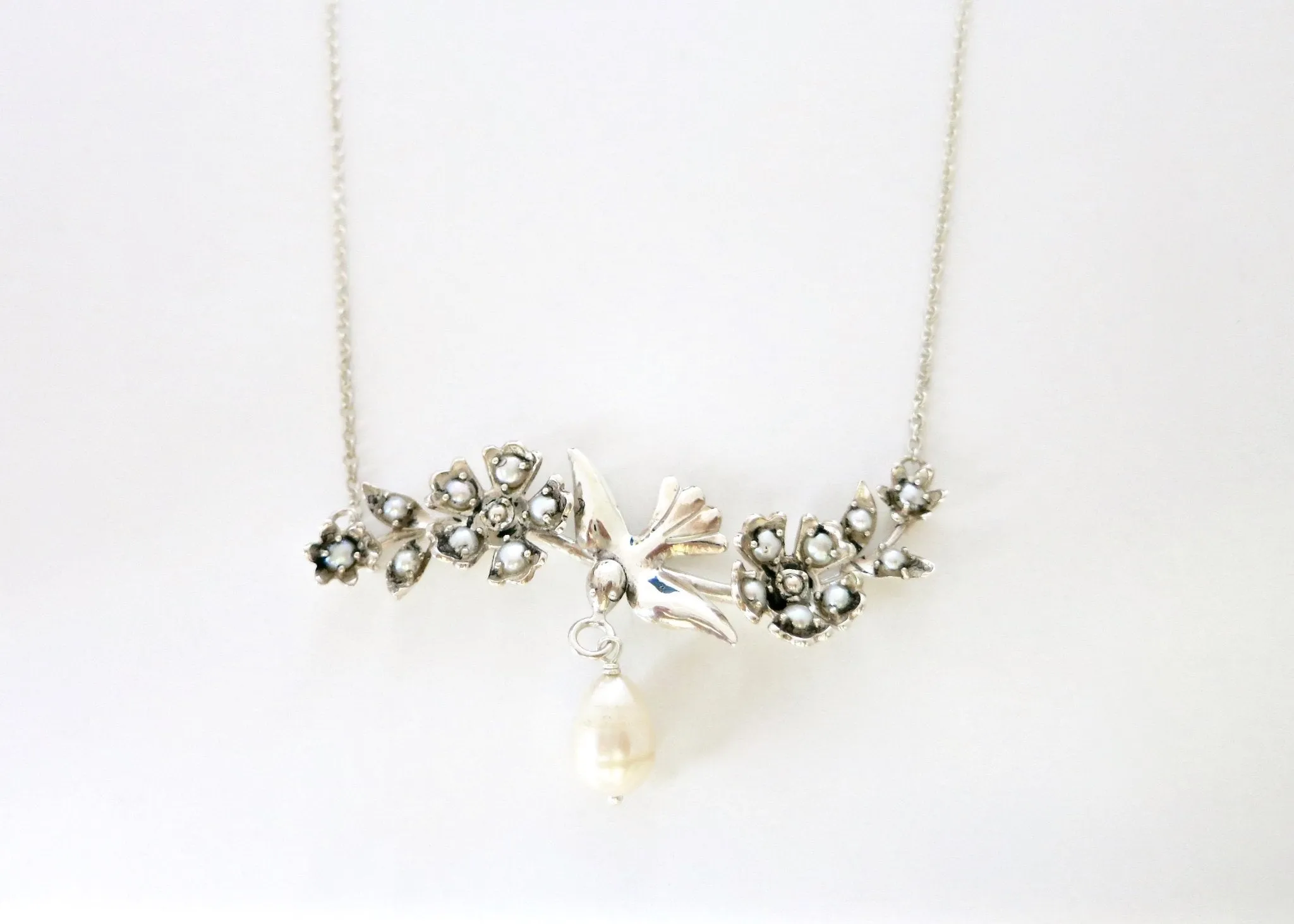 Exquisite, pearl encrusted, Victorian swallow pendant necklace