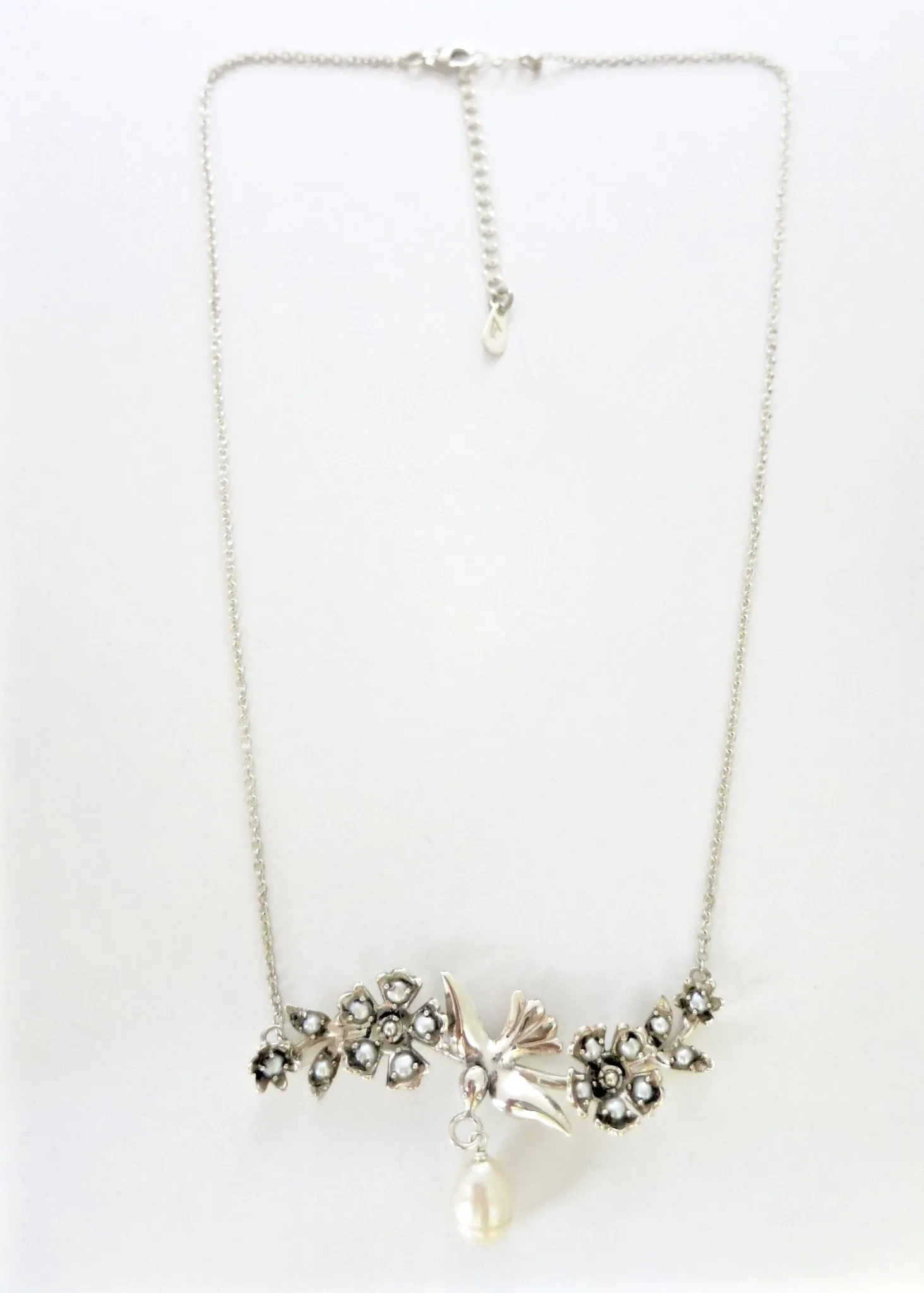 Exquisite, pearl encrusted, Victorian swallow pendant necklace