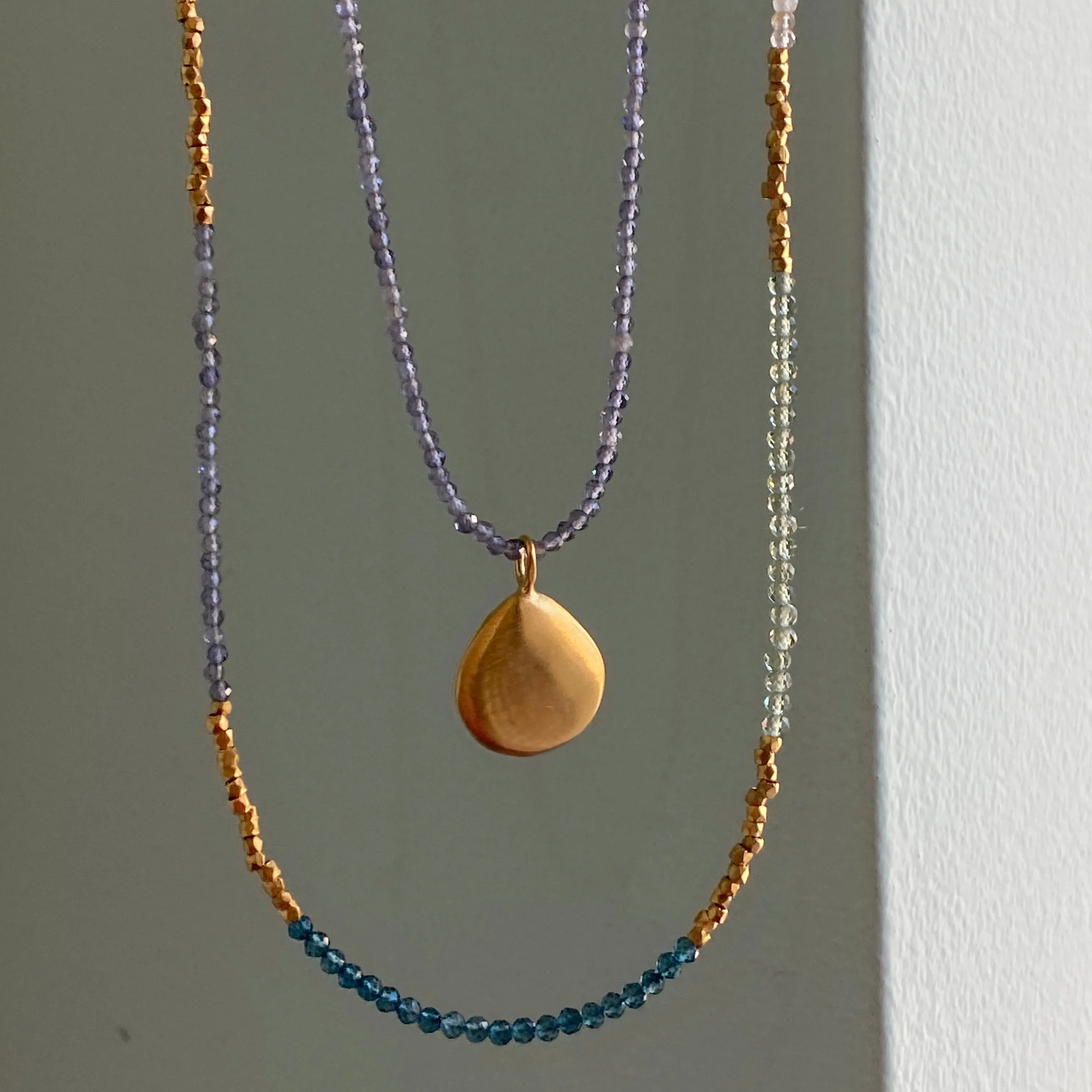 smooth puffy drop on iolite necklace