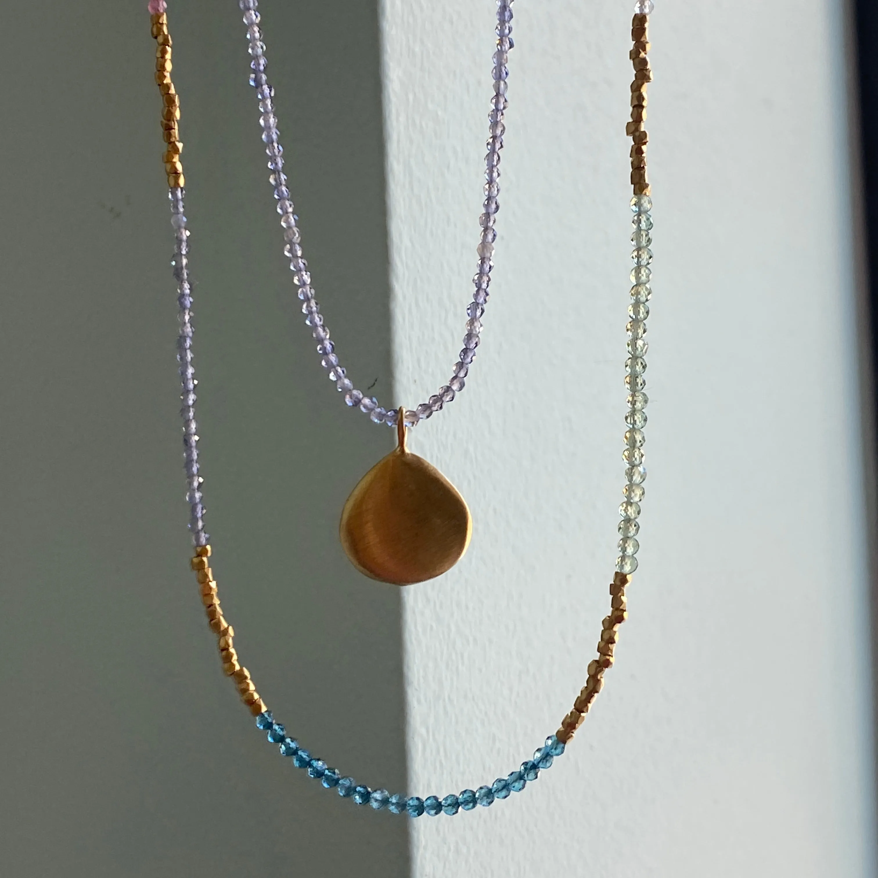 smooth puffy drop on iolite necklace