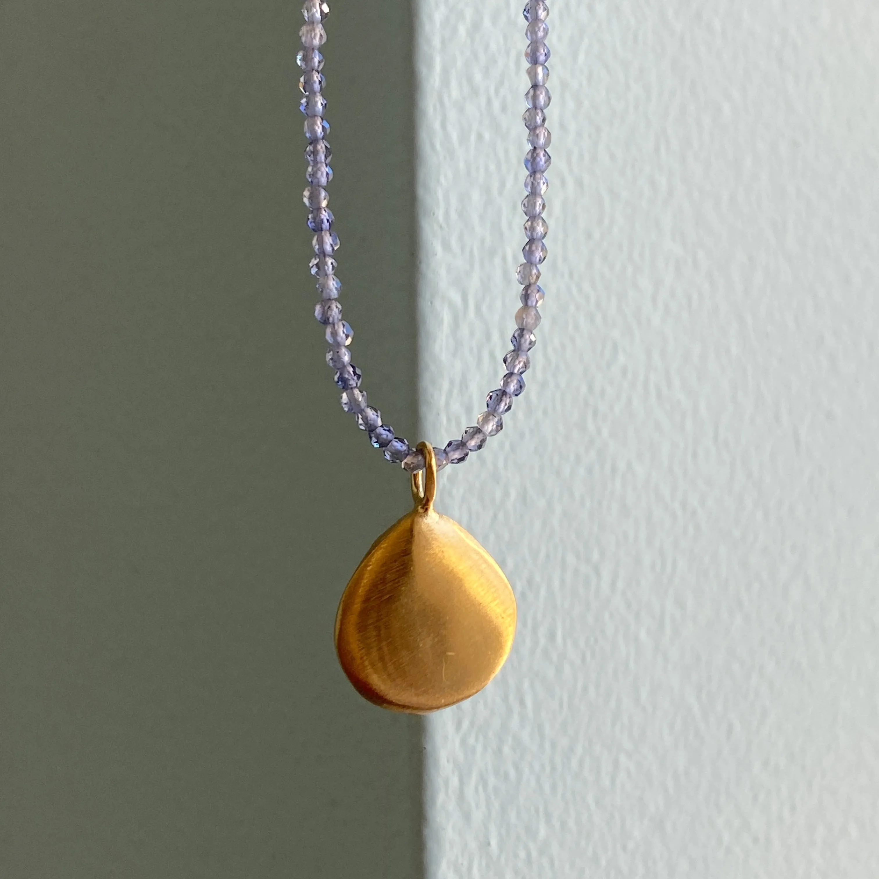 smooth puffy drop on iolite necklace