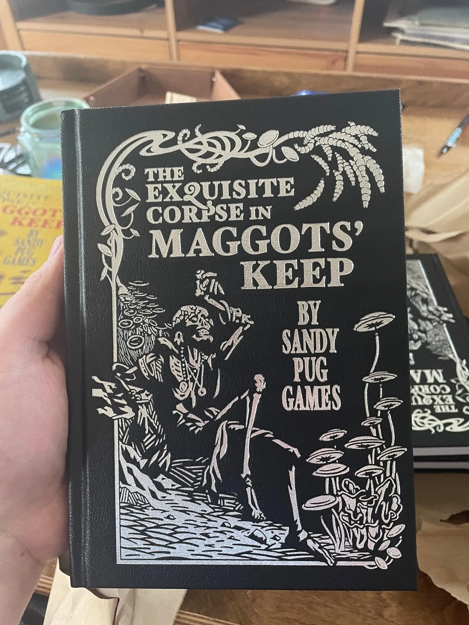 THE EXQUISITE CORPSE IN MAGGOTS' KEEP   PDF