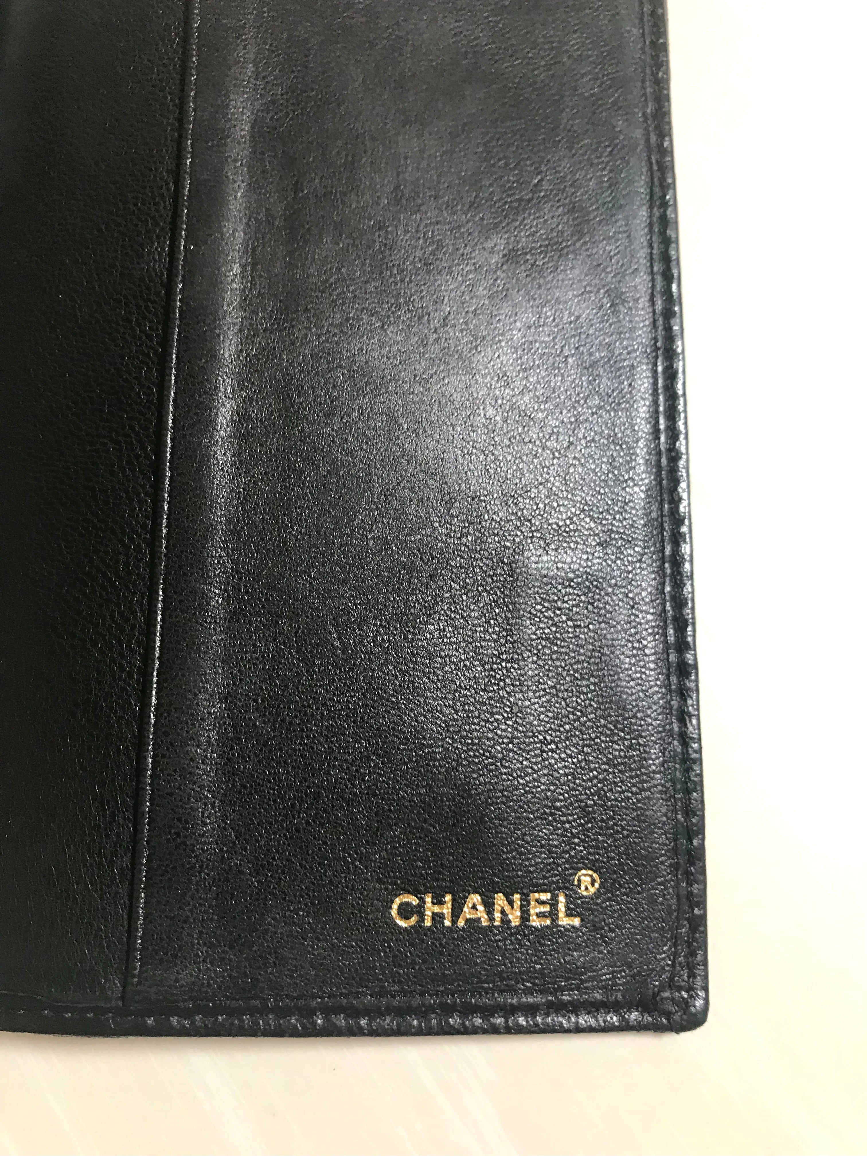 Vintage CHANEL black stitched leather book cover, diary cover, checkbook case etc. Unisex purse. Classic and simple beauty.